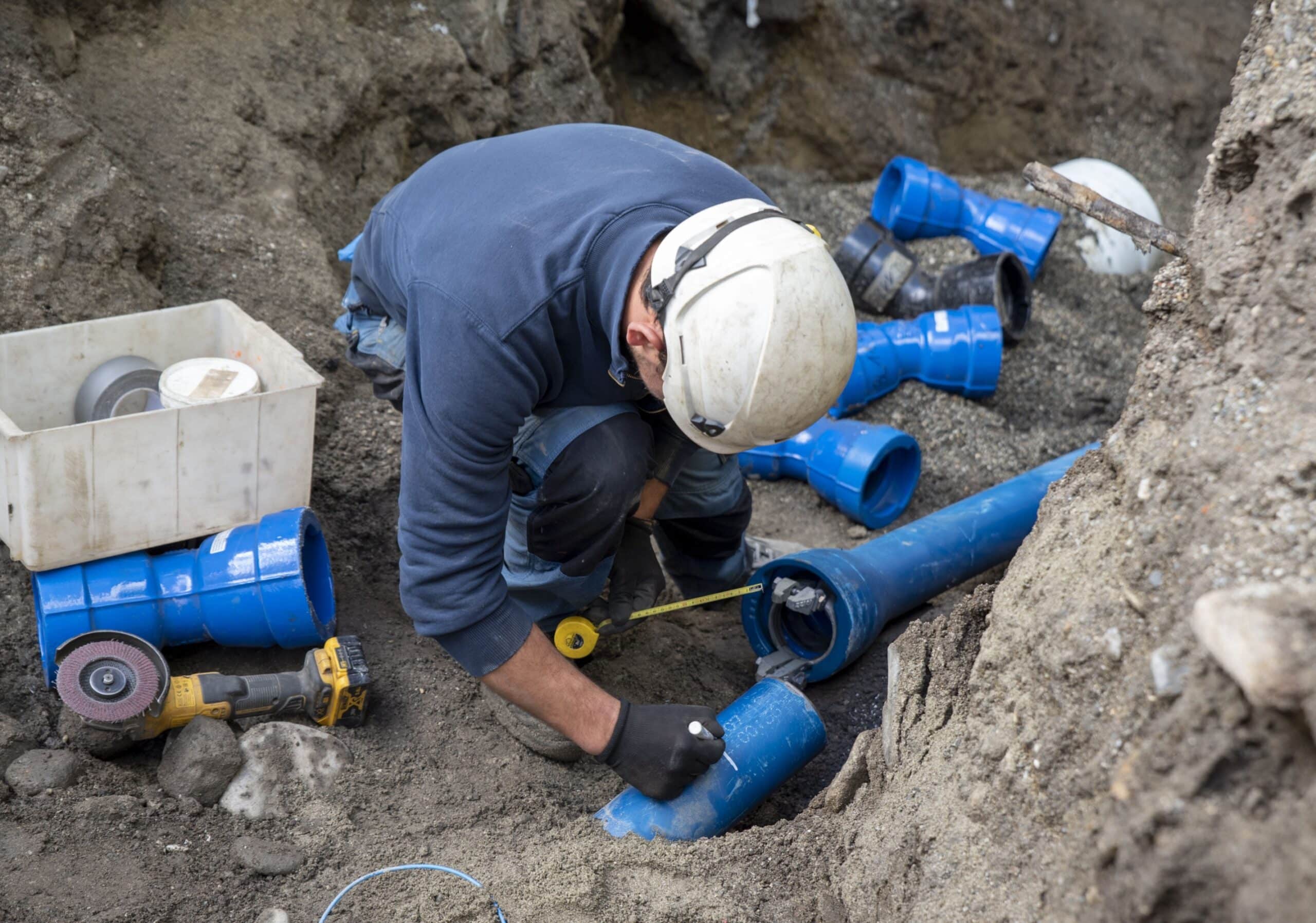 Expert Sewer and Water Damage staff working on a new underground water system.